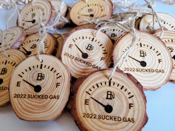2022 Christmas ornaments engraved with the words 2022 Sucked Gas with a gas gauge on empty.